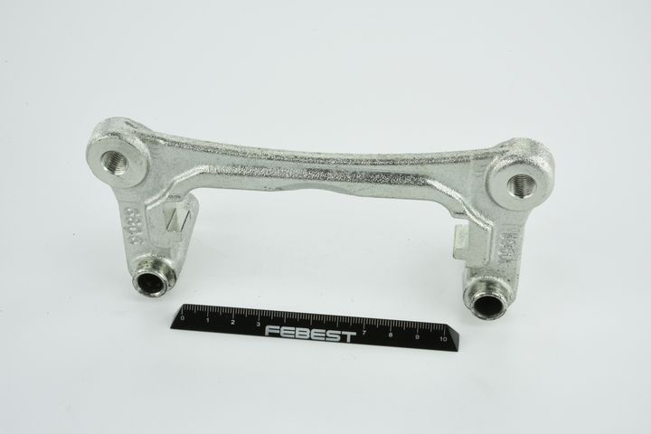 FEBEST 0477C-NA4R - Bremssattelhaltersatz